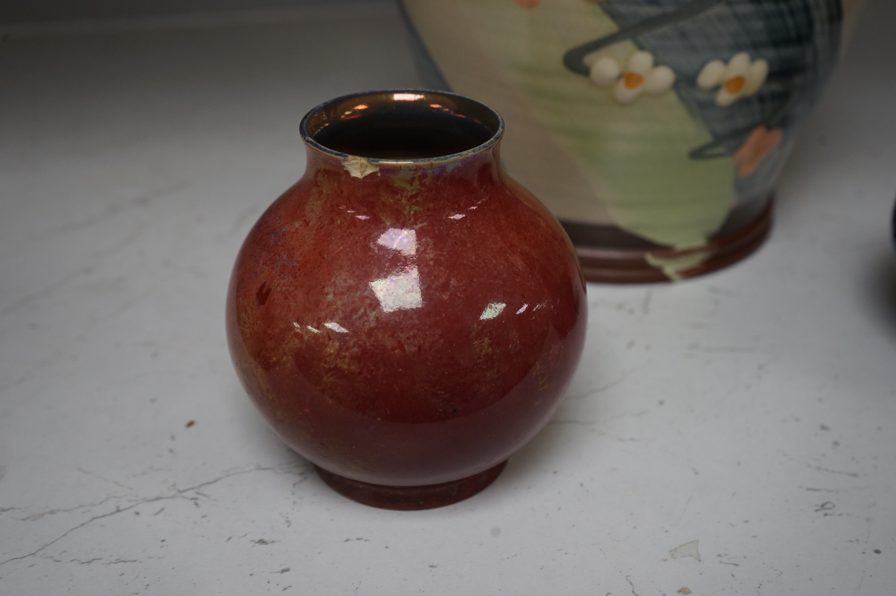 A Royal Lancastrian vase and a Dupuy vase and a Sally Shrimpton studio floral pottery jar and cover, largest 24cm high. Condition - good, Lancastrian vase chipped/cracked (3)